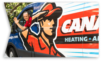 Canady's technician waving from a service truck